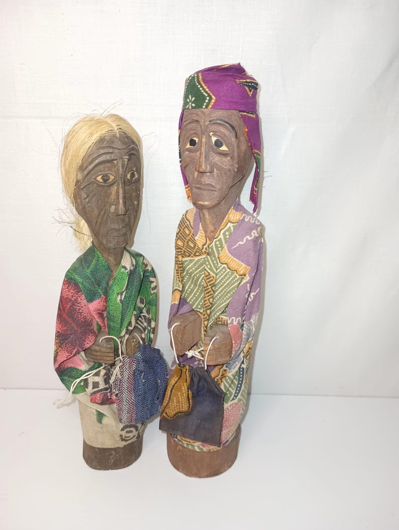 2 Folk Art Bali Figurines. 2" x 10"